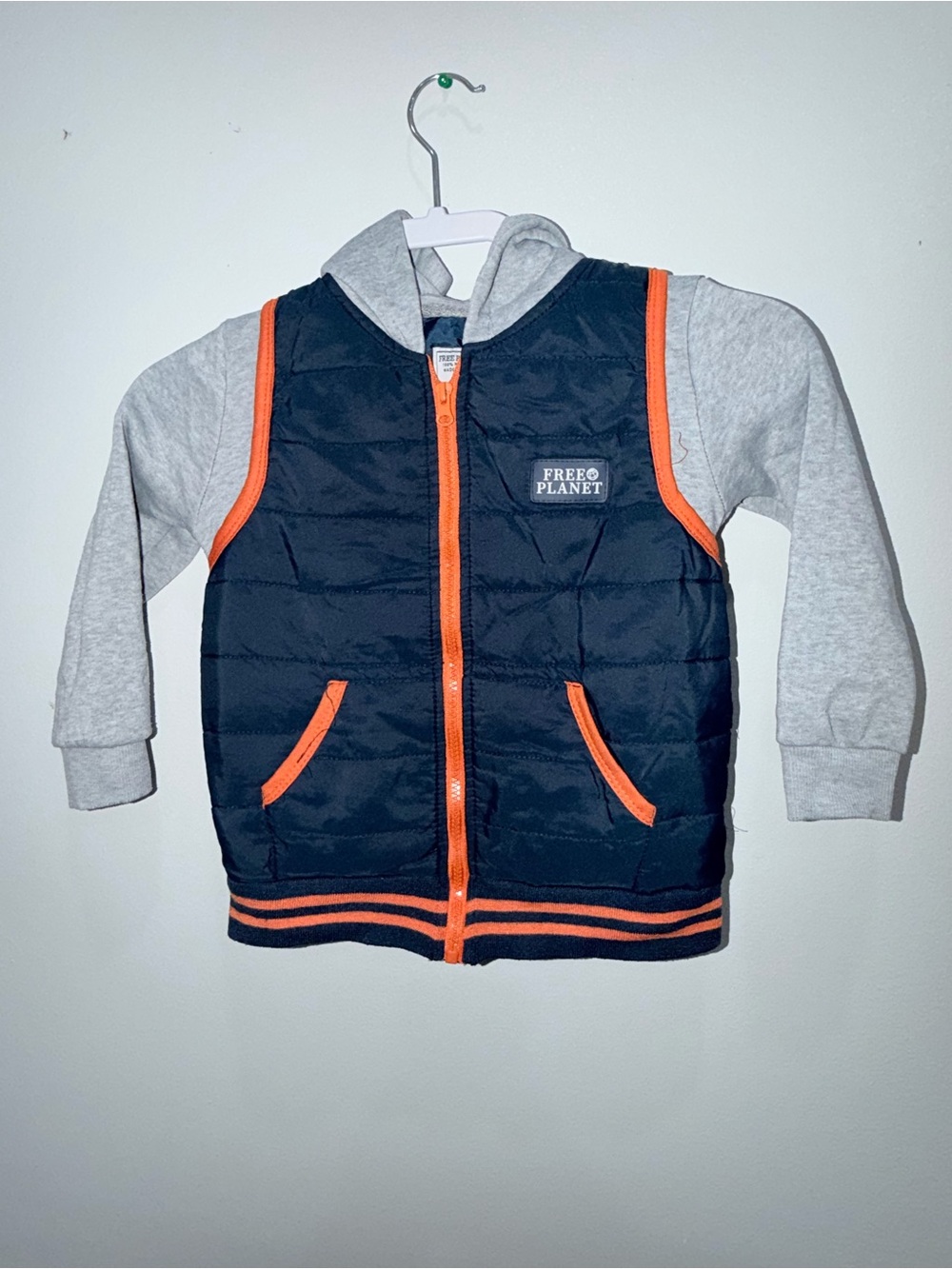 Free Planet Navy Puffer Vest with Gray Hoodie and Orange Trim